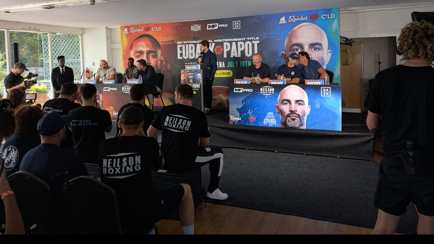 Eubank v Papot press conference with cameras covering the top table